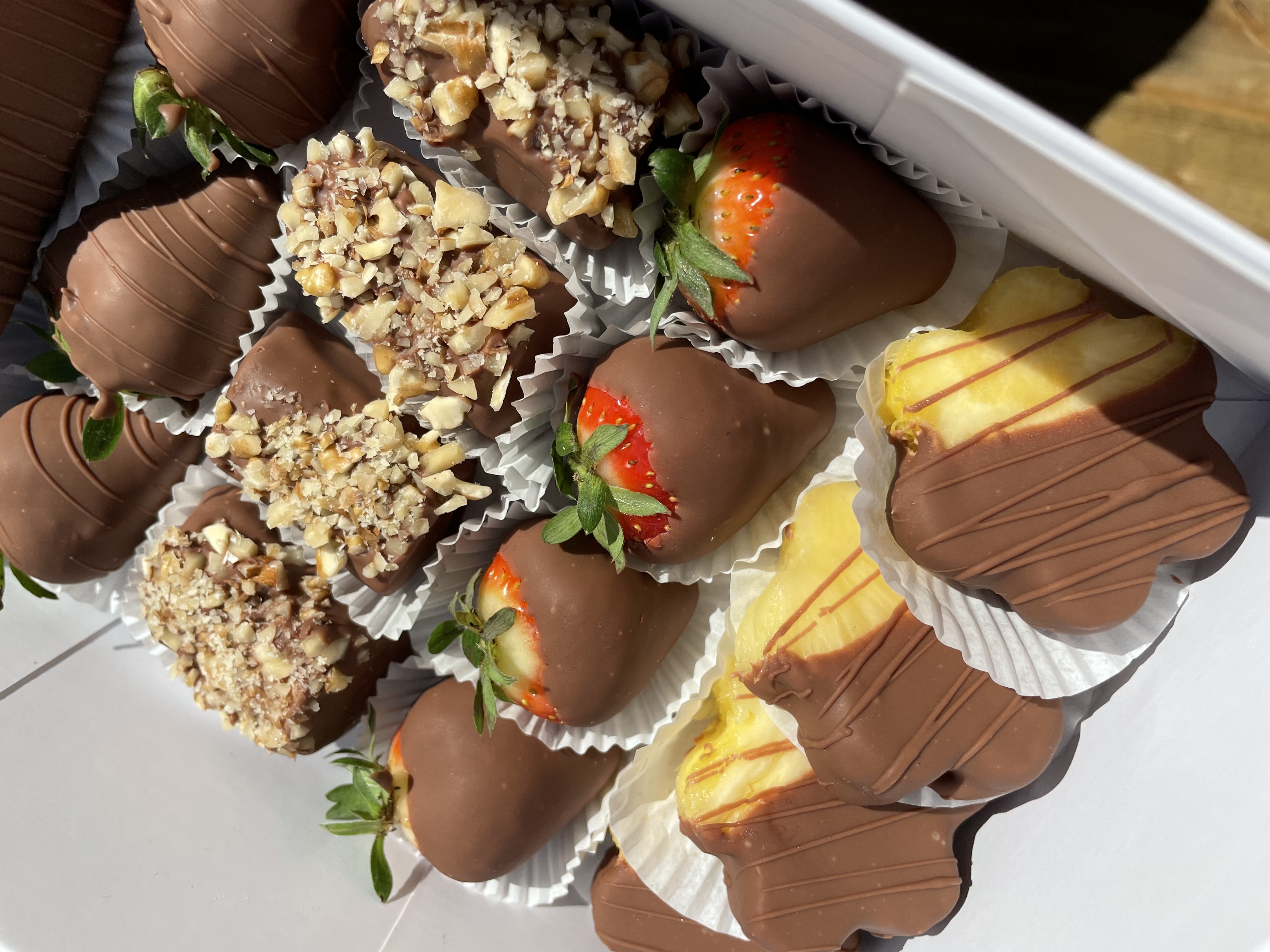 ChocoBerries Mixed Box with chocolate-dipped strawberries and flower-shaped fruit pieces in a white gift box
